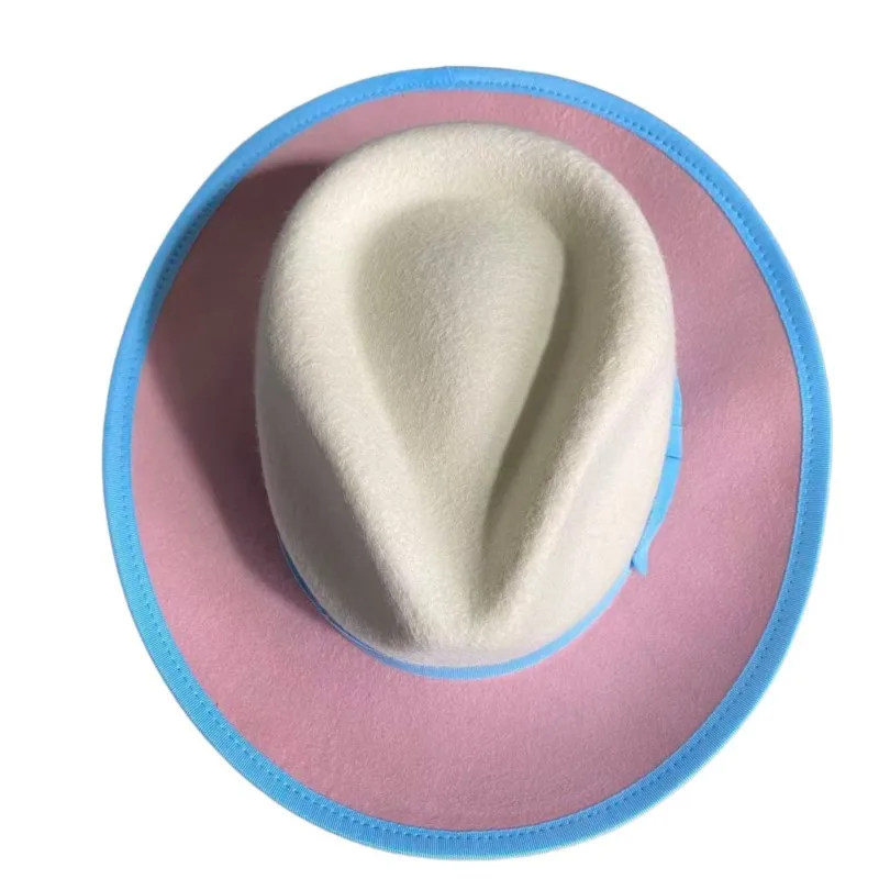 A white and pink patchwork top hat with knot decoration felt