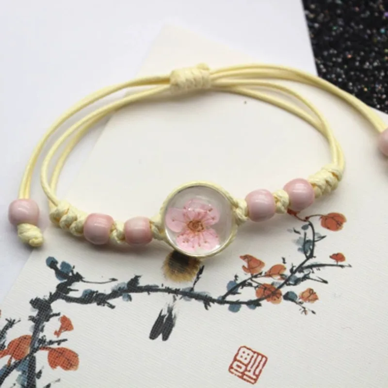 

Ceramic glass ball dried flower plant real flower woven bracelet snow bead flower simple female student