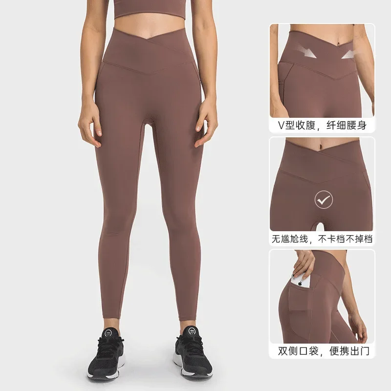 New cross waisted sports leggings for women without T-line, high elasticity and hip lifting nine point yoga pants yoga pants