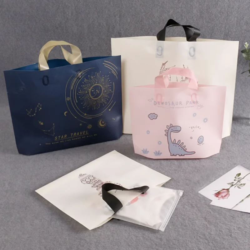 50 unids/lote bolsas de embalaje de ropa para pequeñas empresas bolsa de regalo de plástico PE con asa paquete de regalo de boda de cumpleaños de Navidad