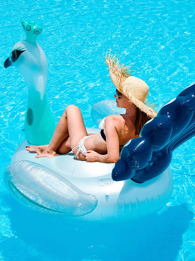 Inflatable peacock water floating mount toy swimming ring adult swimming floating bed floating row seaside photo