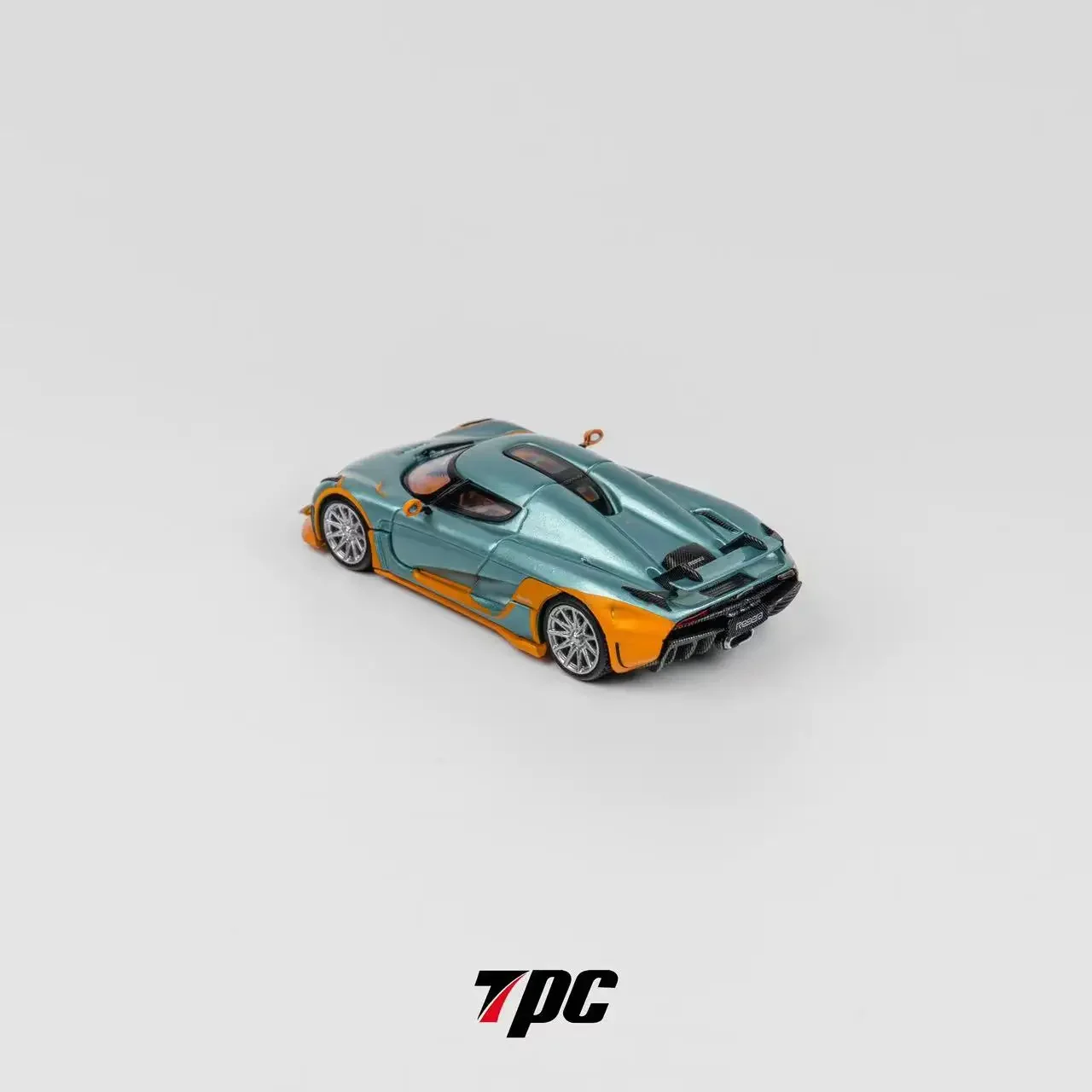 TPC 1:64 Regera Iceblue mit orangefarbenem Lackiermodellauto