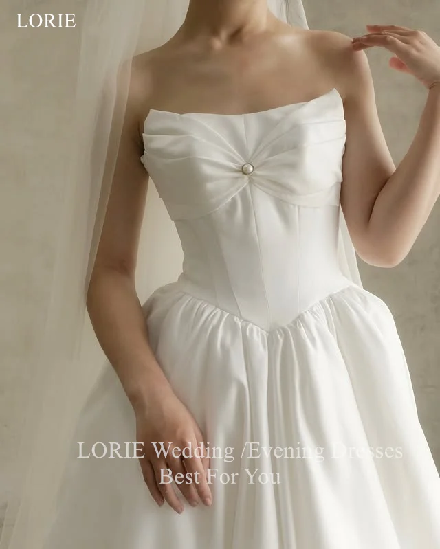 LORIE elegante satijnen strapless trouwjurken a-lijn mouwloze bruid galajurk strik parels geplooide bruidsjurken op maat