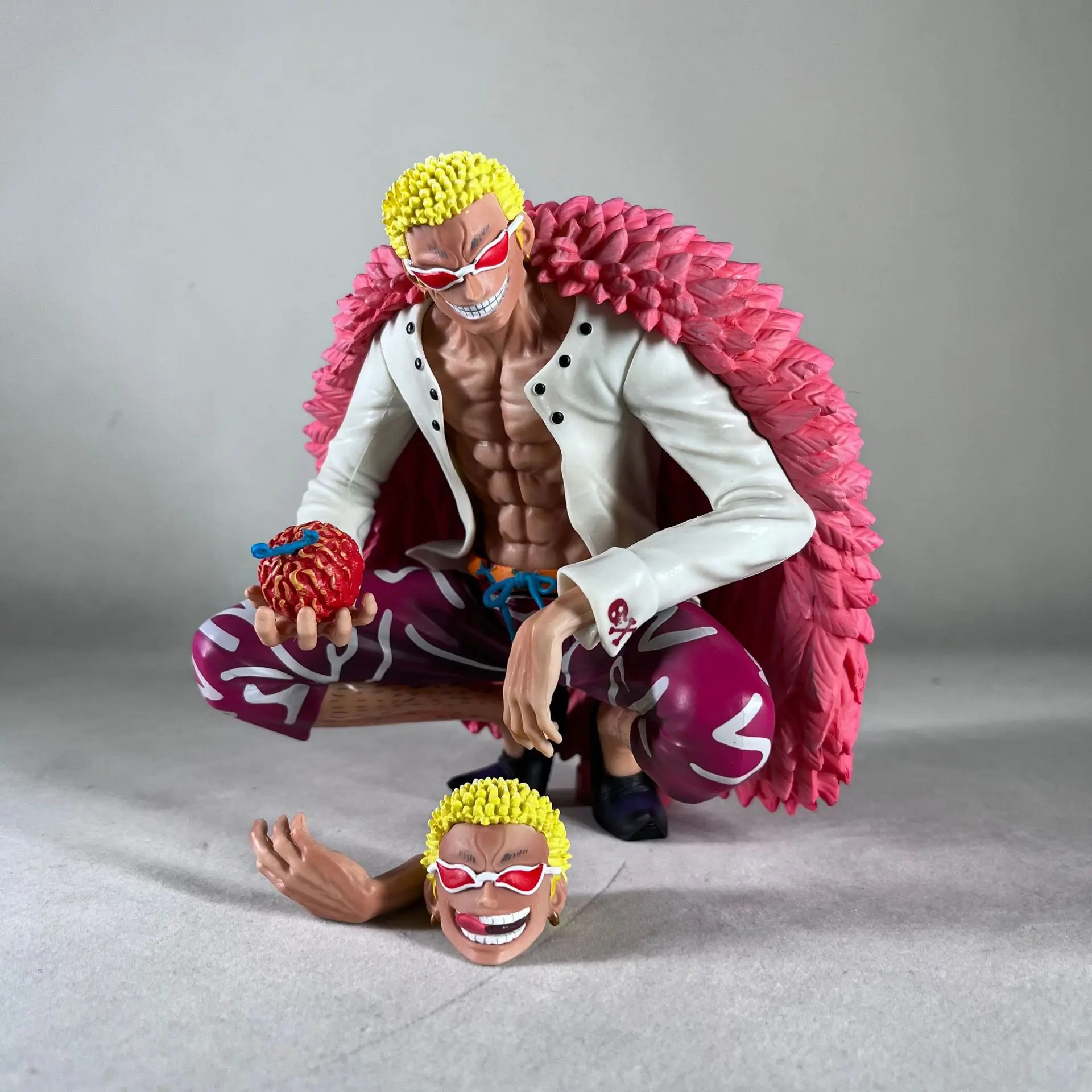 New One Piece Anime Figure Donquixote Doflamingo Toy 16cm Squatting Double Headed Carving Devil Nut Model Doll Gift Decoration