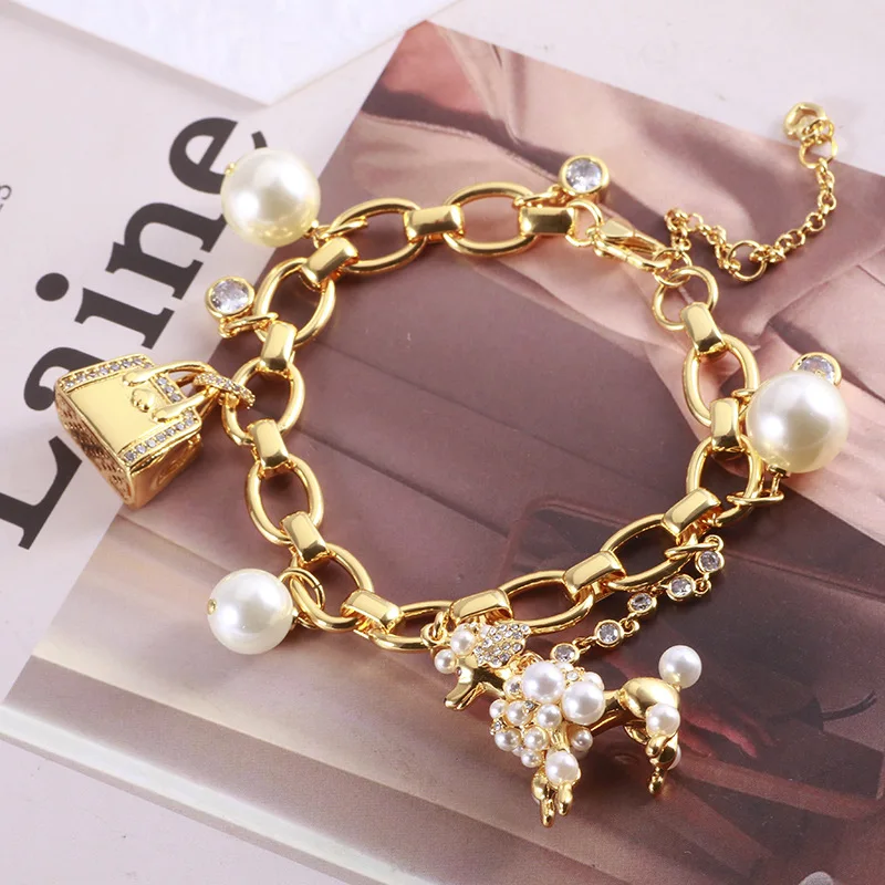 

Wholesale Jewelry Enamel Glaze Cute Three-dimensional Handbags Cute Dog Pearls Multiple Pendant Bracelets Jewelry Set for Women