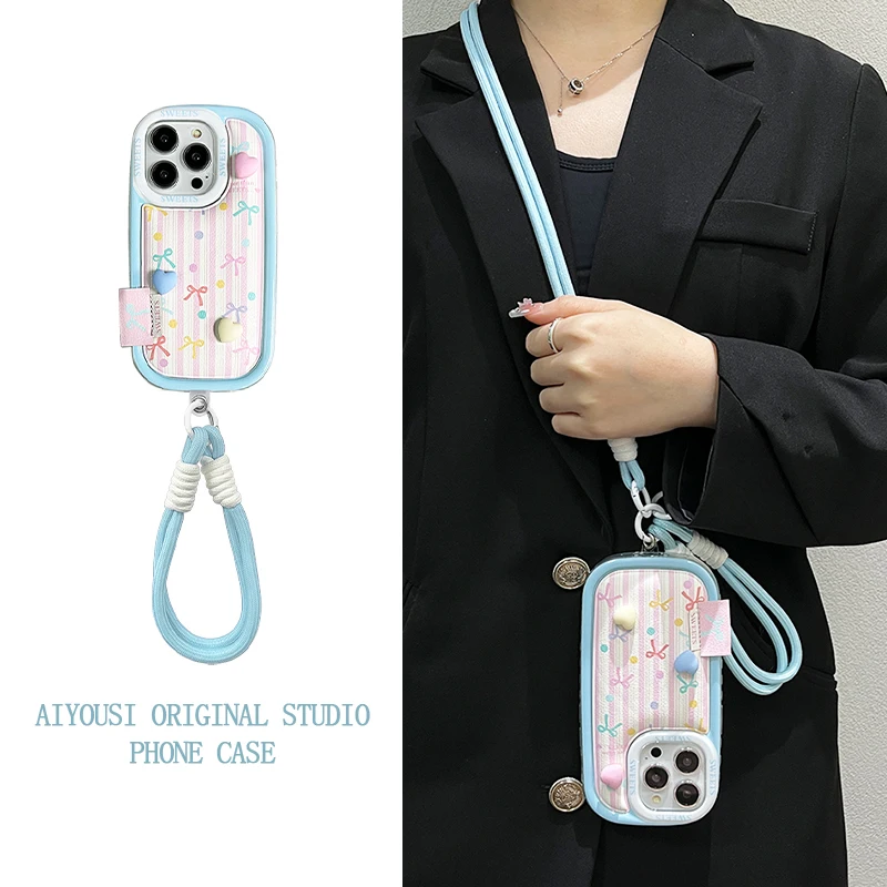 

Dreamy blue pink striped bow handheld for iphone15 case 14/13promax air cushion case phone12 niche 11 anti fall 15promax