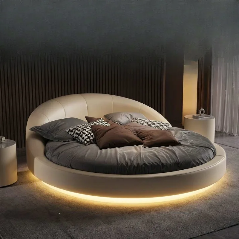 Round bed double bed, leather master bedroom high-end villa atmosphere simple modern round cream wind LED light hotel bed