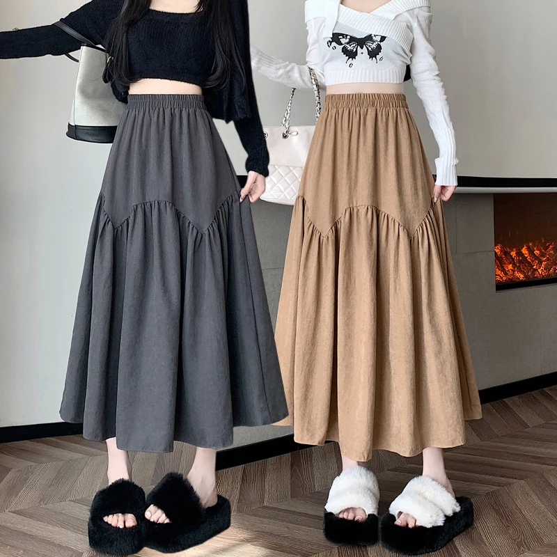 Half length skirt for women in autumn, with a high waist and a drooping feeling. A-line skirt, mid length and large swing skirt