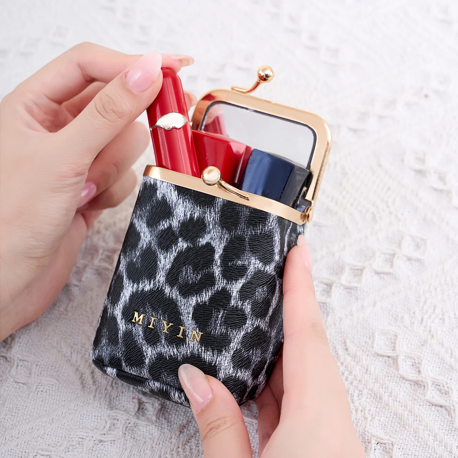 Luxury Style Mini Portable Women's Lipstick Organizer Also Functions as a Jewelry Earphone and Coin Purse with a Built-in Mirror view 3