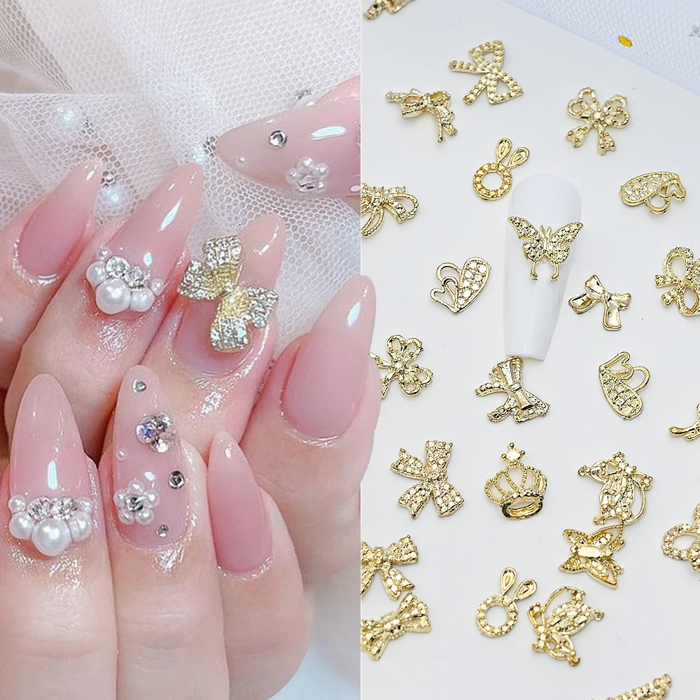 50pcs Radom Mini Luxury Alloy Butterfly Nail Jewelry 3D Gold Silver Bowknot/Gun/Crown Nail Metal Parts Shiny Mixed Nails Accesso