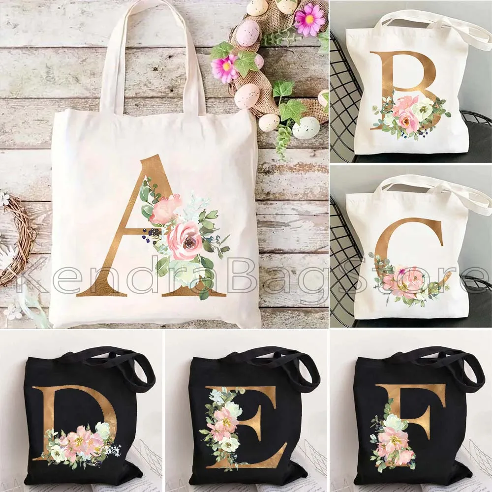 

Gold Floral Letter English Alphabet Pink Flowers Initial Letter Wedding Gifts Women Canvas Shoulder Tote Bag Shopper Eco Handbag