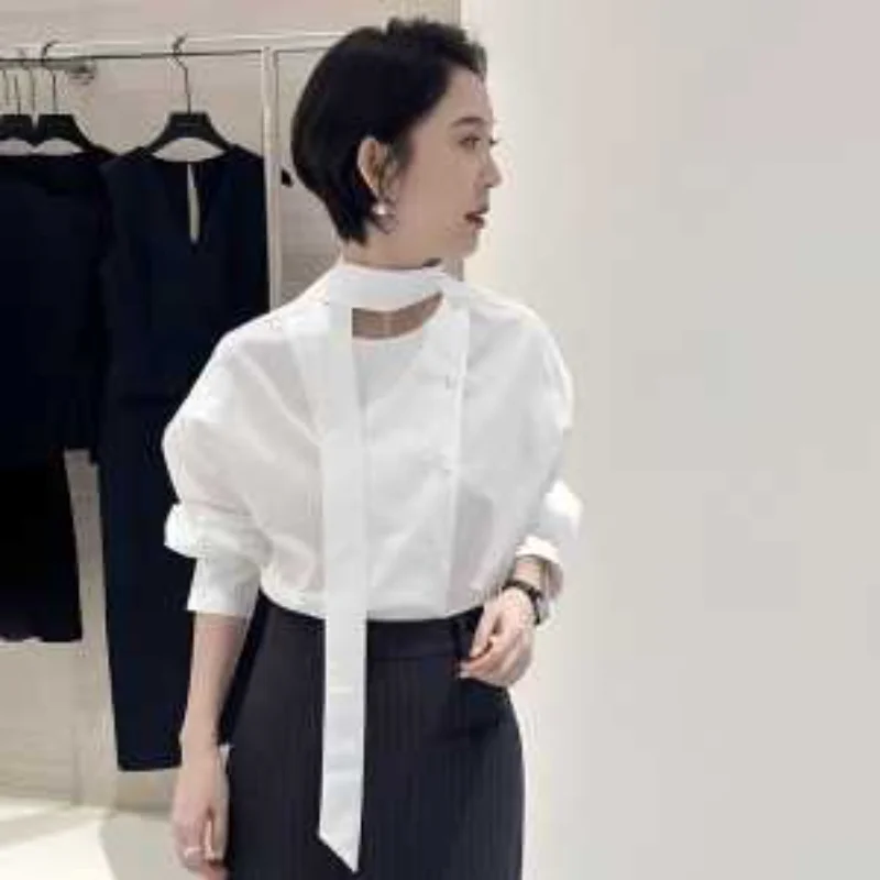 เสื้อเชิ้ตแขนยาวดีไซน์ฝรั่งเศสแบบไม่สมมาตรสำหรับผู้หญิง ฤดูใบไม้ร่วง 2025 รุ่นใหม่ สไตล์ผู้ใหญ่เบาๆ