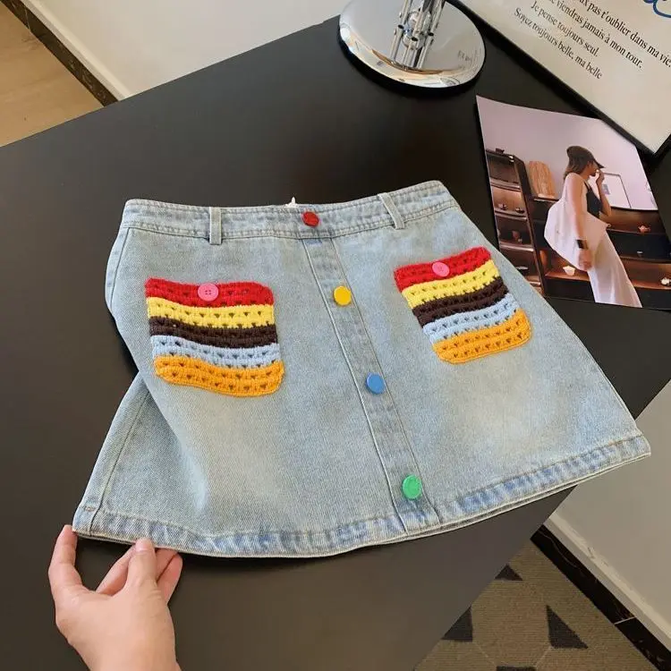 Light-colored denim short skirt with a word showing thin design sense, hip skirt women's 2026 new small summer thin