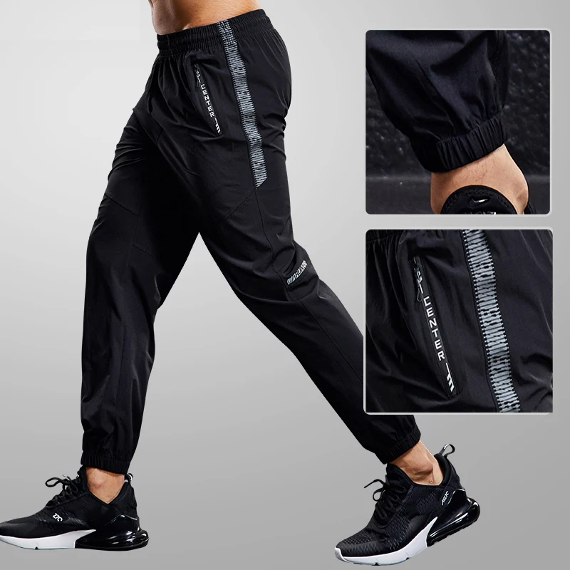 Pantalones deportivos de secado rápido para hombre, pantalones para correr con bolsillos con cremallera, pantalones deportivos para correr, pantalones de chándal informales para Fitness