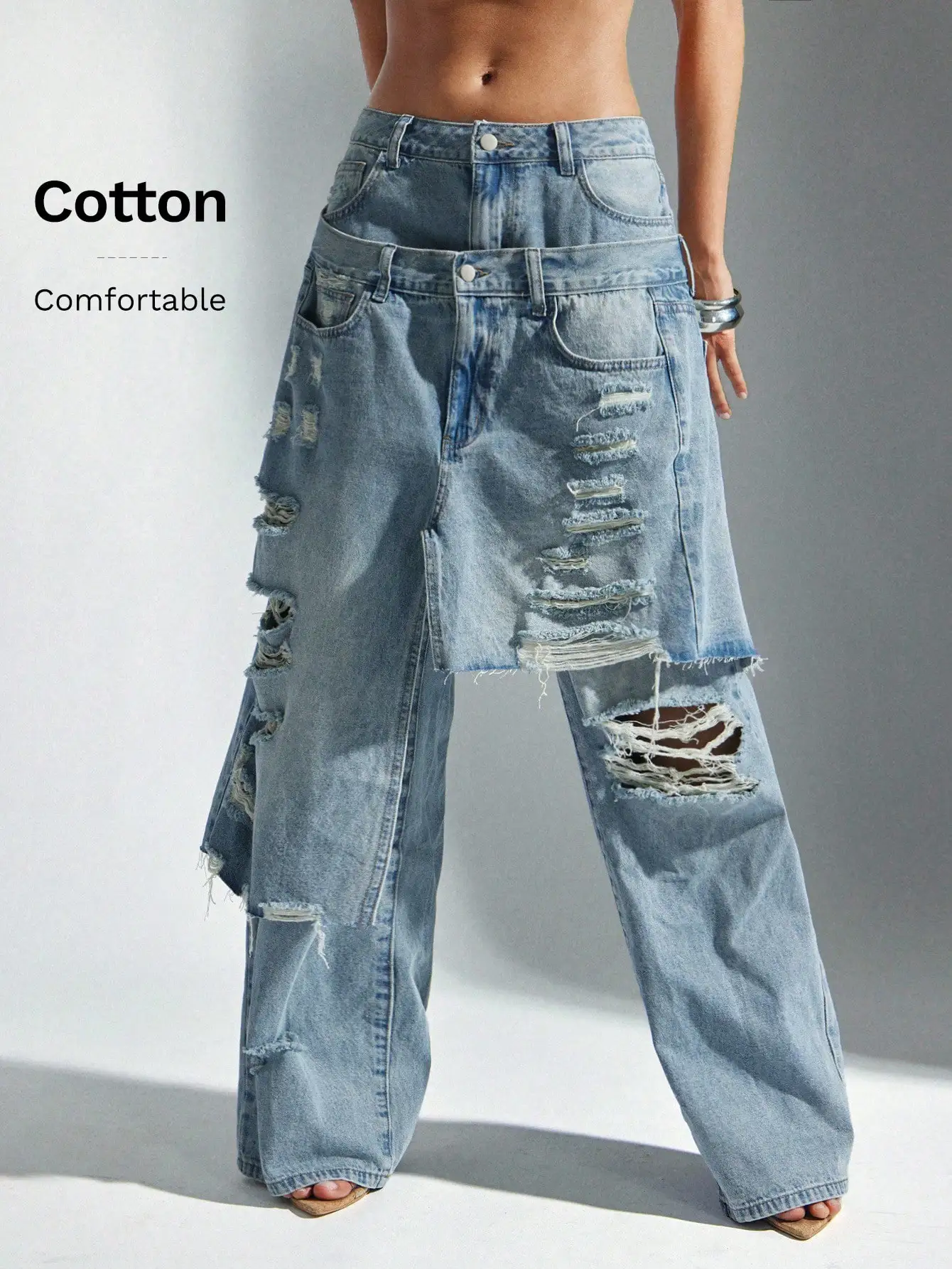 

Женские широкие джинсы оверсайз с эффектом потертости и многослойным поясом