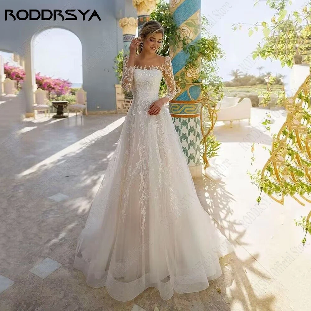 RODDRSYA رائعة تول فساتين الزفاف طويلة الأكمام مغرفة الرقبة فساتين العروس الوهم الظهر زين خط vestidos de noviaRoddrsya غرامة الشاش فستان الزفاف كم طويل فضفاض السرة ثوب الزفاف فانتوم ظهر حرف الشارات