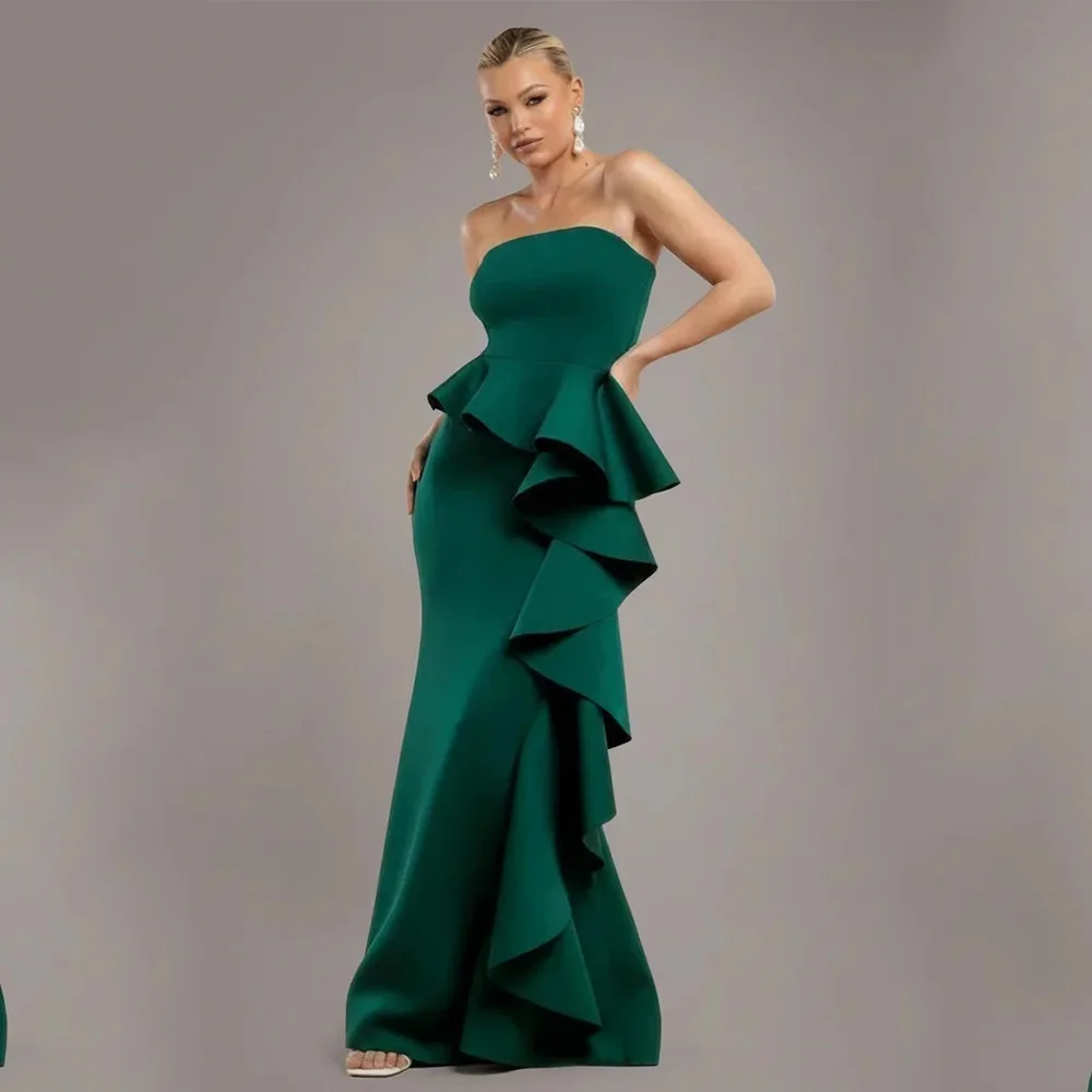 

Custom green strapless gown with big ruffle front, elegant design shows soft and classy temperament
