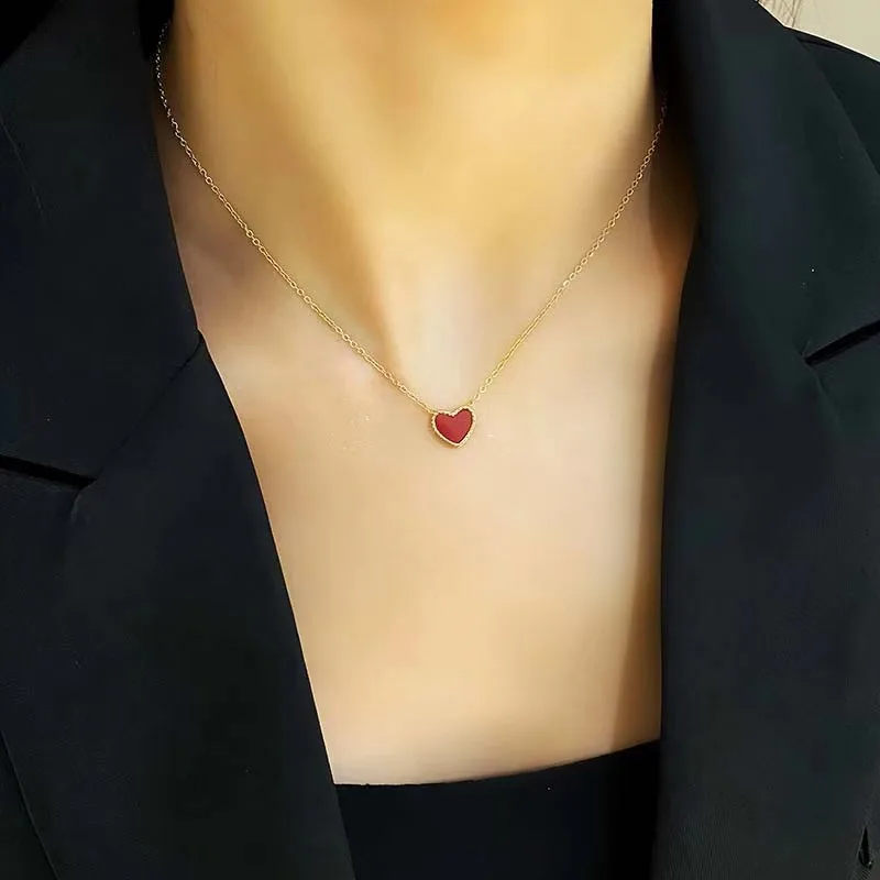Double-sided heart-shaped love pendant titanium steel necklace female plated 18K rose gold collarbone chain fashion hundred with