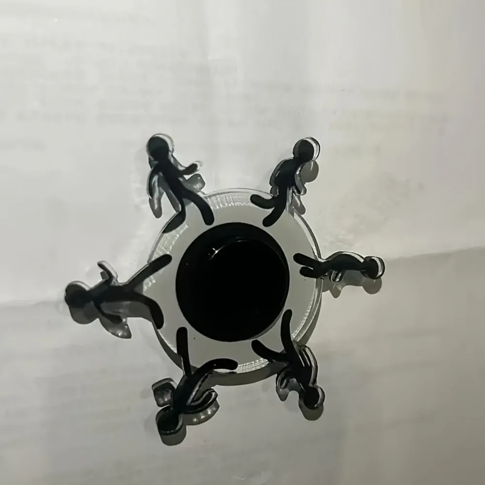Fidget-Spinner-Spielzeug, sensorisches Stressabbau-Spielzeug für Kinder und Erwachsene, Fidget-Spielzeug – drehende bewegliche Figur mit schwarzen Silhouetten