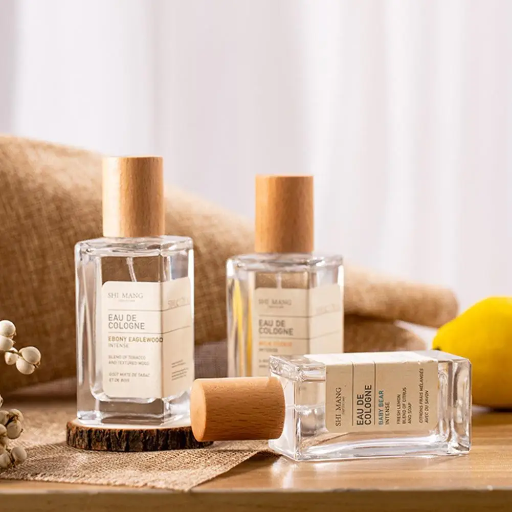 Frasco de perfume de vidro quadrado 50ml, frasco de spray transparente, garrafa de embalagem, atomizador recarregável, recipiente cosmético de viagem de alta qualidade