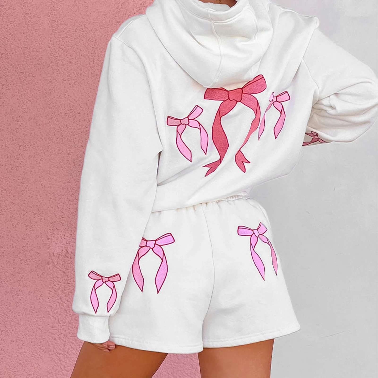 

Combhasaki Women's Y2K 2Pcs Outfits Set Long Sleeve Bow Print Hooded Pullovers with Kangaroo Pocket + Drawstring Wide Leg Shorts
