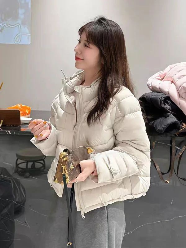 

2025 Winter Thickened Puff Cotton Jacket Women's Fashionable Korean Style Loose Fit Pure Color Stand Collar Outerwear