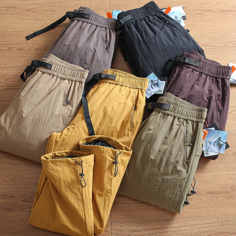 

Мужские утепленные пуховые брюки для активного отдыха с наполнителем 90% пухом, защищающие от экстремальных холодов, модные, прямого кроя, черные.