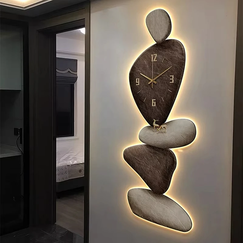 Entrance LED wall light with stone base that operates with a clock and emits light. Modern entrance wall art light.