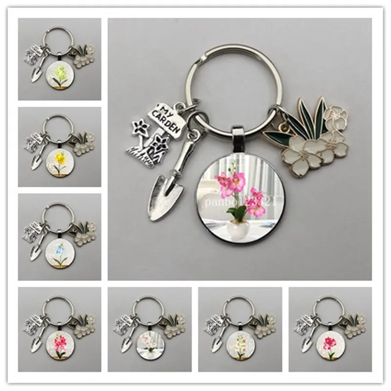 Fashion keychain popular indoor orchid and grass charm, orchid flower shovel keychain, men and women gift jewelry keychain.