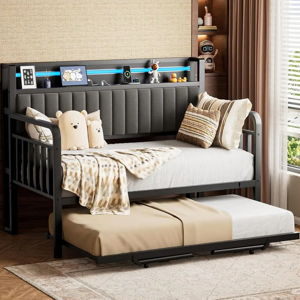 Heavy-Duty Metal Twin Daybed with Trundle, LED Lights, Upholstered Storage, and Charging Station in Black