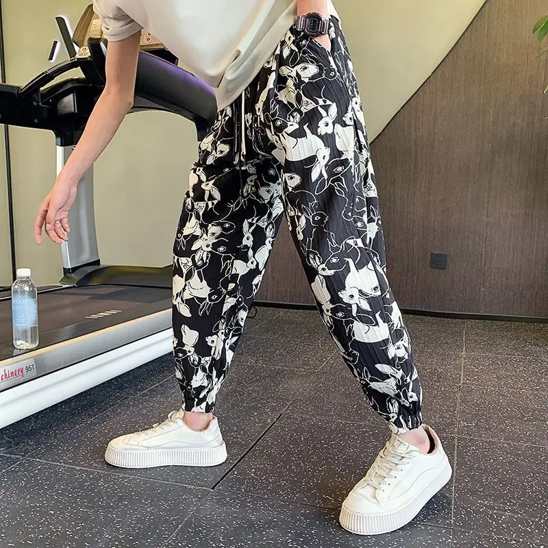 Летние тонкие мужские укороченные брюки из ледяного шелка с принтом, свободные мужские повседневные шаровары, большой размер, дизайнерская оригинальная одежда, дешевые брюки