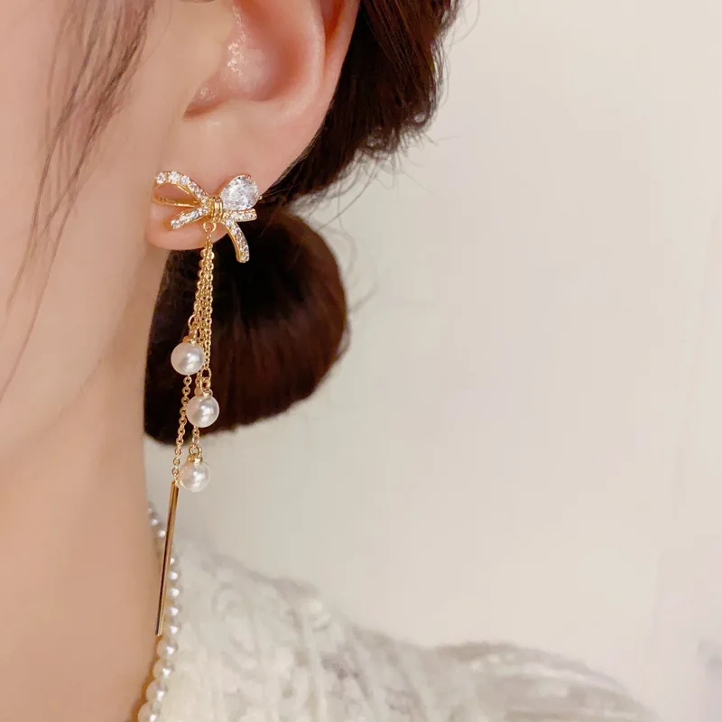 Korean Style Micro Inlaid Zircon Bow Pearl Long Tassel Personalized Fashion Light Luxury High-end Earrings for Women Jewelry.