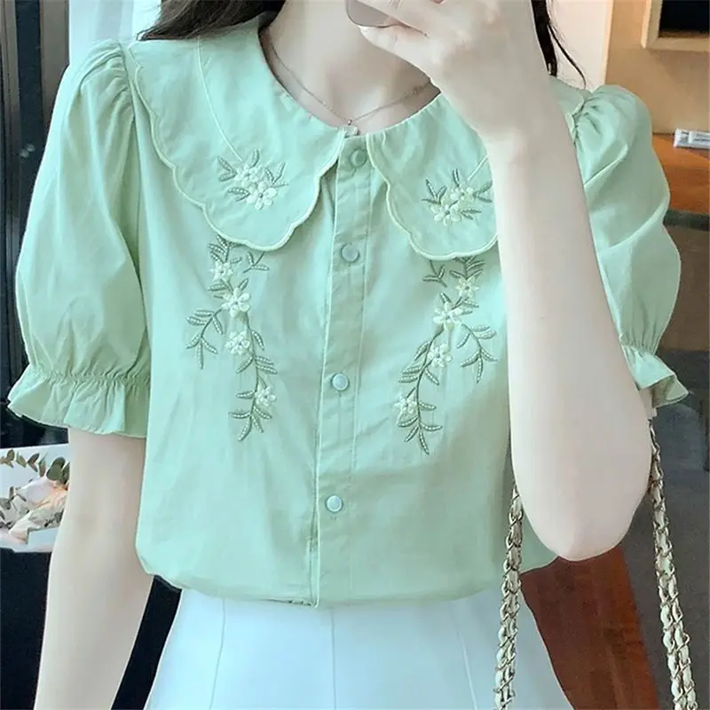 

Sweet Peter Pan Collar Spliced Ruffles Embroidery Shirt Women's Clothing 2023 Summer New Casual Tops Loose Office Lady Blouse