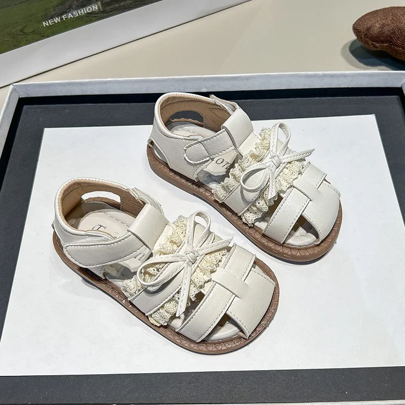 

Kids Leather Cage Sandals for Girls 2025 Summer Non-slip Toddler Beach Shoes with Cute Bow Princess Elegant Party Wedding Shoes