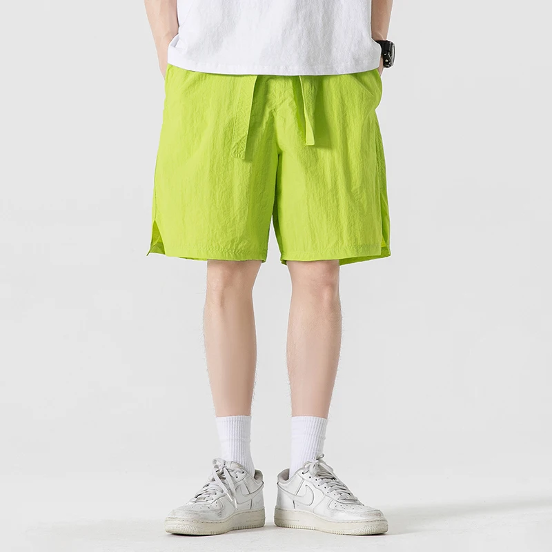 Sommer dünne Modetrend lässige Shorts Herren solide elastische Taille Kordel zug Patchwork Taschen koreanische vielseitige gerade Shorts