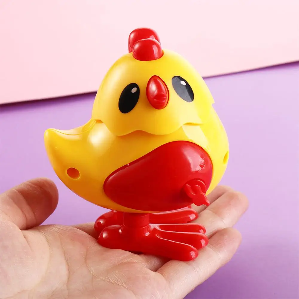 Plástico meninas wind-up primavera frango brinquedo educacional acabar pulando frango brinquedo mini simulação