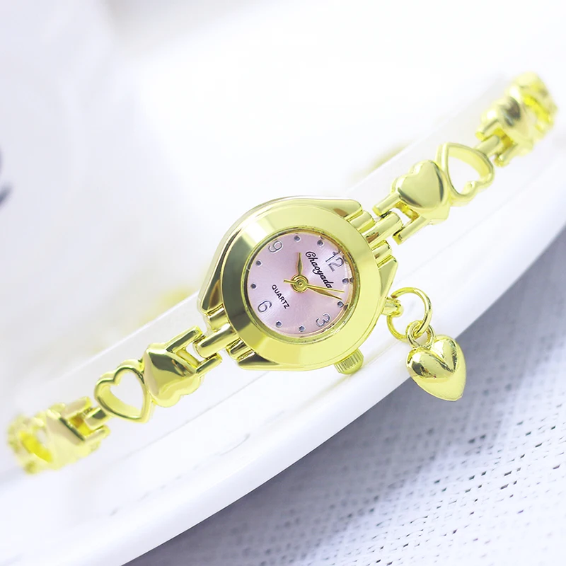 new woman's lady young girls fashion Alloy Heart Hollow Love Pendant quartz bracelet wristwatch female thin gold luxury watches