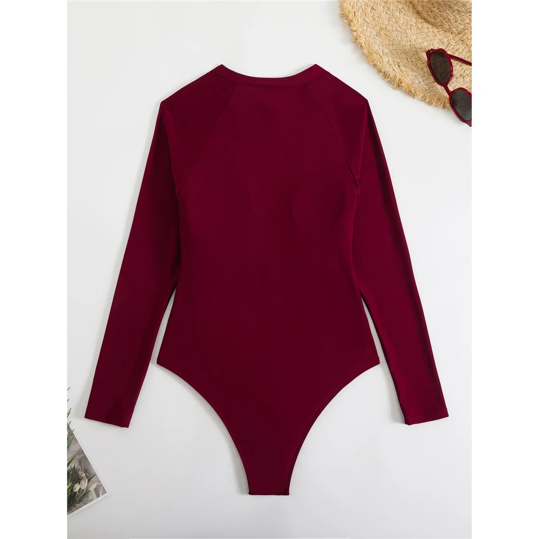 Sexy, hoch geschnittener, bedruckter, langärmliger, mit Reißverschluss versehener Surf-Rashguard, einteiliger Badeanzug, Damen-Badebekleidung, Damen-Badeanzug, Badeanzug, Modell V6285. – Detail 6