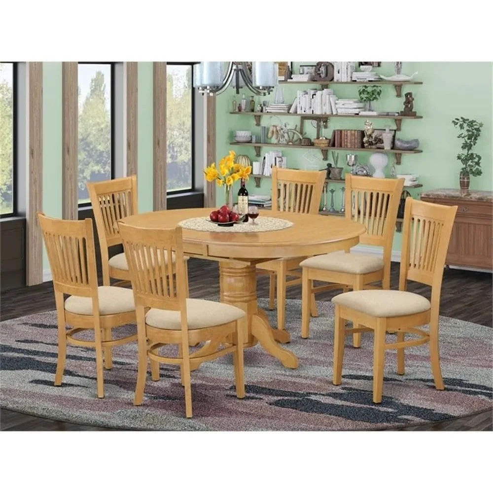 

7 Piece Dining Table Set Consist of an Oval Dining Room Table with Butterfly Leaf and 6 Linen Fabric Upholstered Chairs.