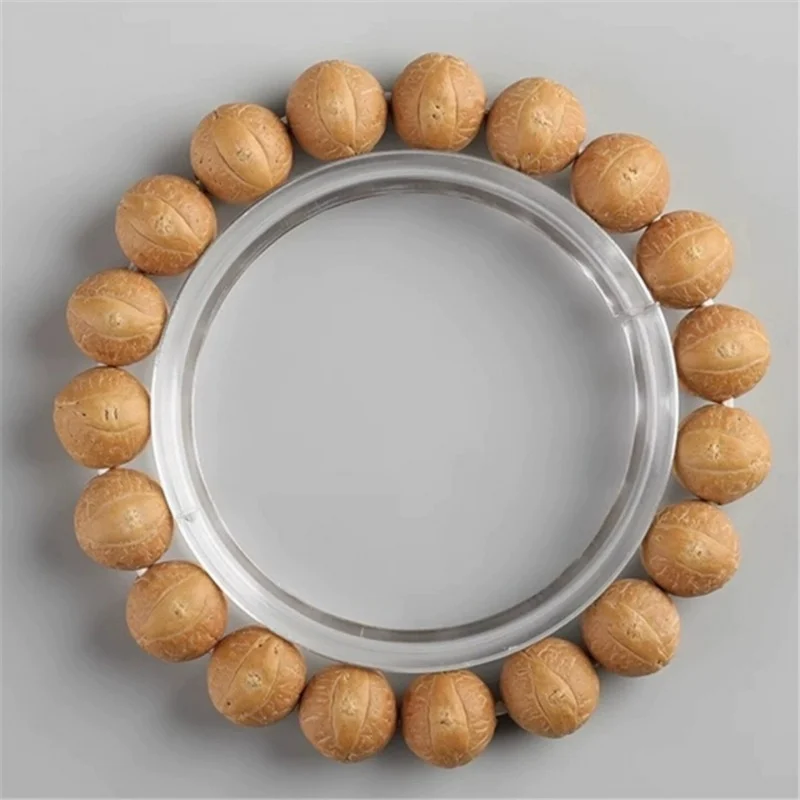 

Буддийский браслет-чётки из семян Бодхи Фонгян (Непал), высокоплотный, с жёлтой коркой, однорядный, ручной работы