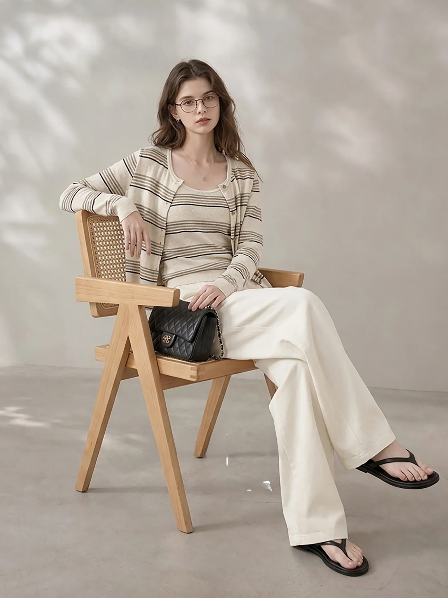 

HUAAPPUW Retro Striped Loose Fashion Set 2026 Early Autumn New Style Strap Cardigan Two-Piece Set Lightweight Office Wear