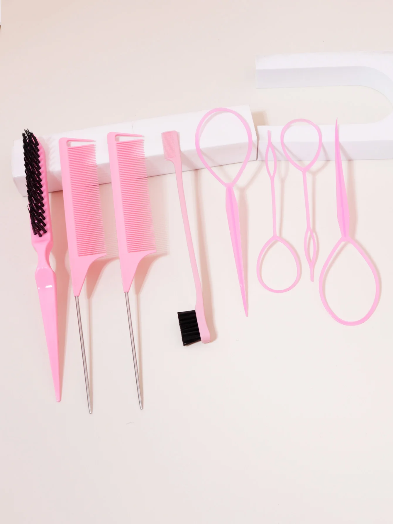 Comb styling set with nylon hair brush, steel needle pointed tail comb, edge control brush, and 4 hair tail tools