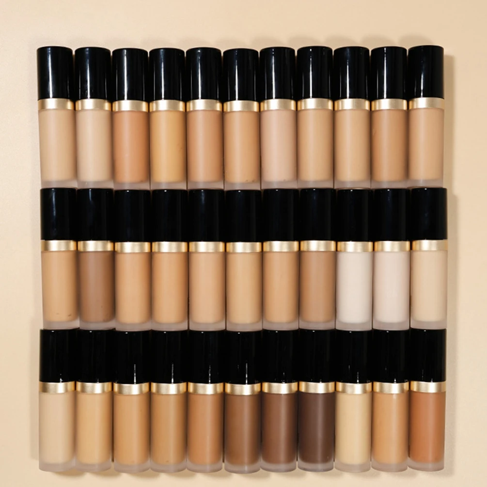 Corretivo líquido de marca própria de 4 cores logotipo personalizado tubo redondo com tampa preta contorno à prova de suor maquiagem facial de longa duração vegana