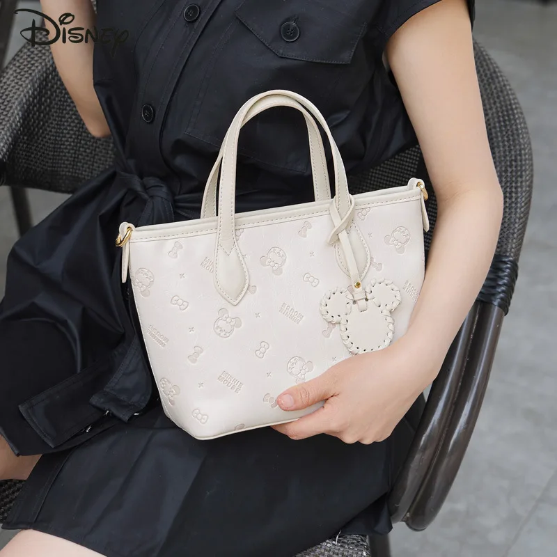 

Disney Minnie 2026 New Women's Handbag Fashion High Quality Women's Crossbody Bag Solid Color Versatile Girl Phone Storage Bag