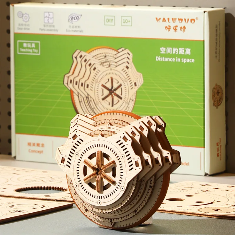 The assembled model of the wheeled mechanical measuring instrument is made of wood and is a handcrafted three-dimensional work.