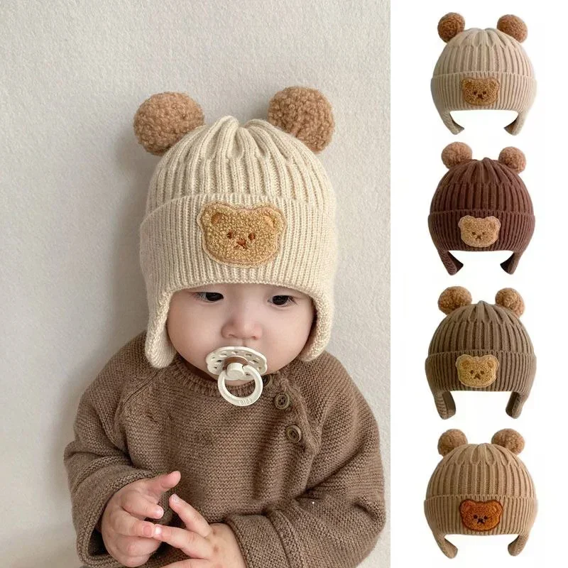 

Baby wool hat cute bear ear protection hat children winter thickened warm knitted Korean version of the baby hat
