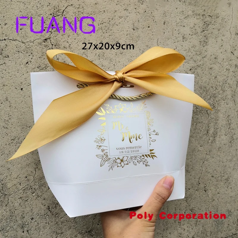 Custom  Wholesale Custom Logo White Paper Gift Bag  Ribbon Luxury Wedding Favor Packaging Bag with Foil Gold Logo Printed for Je