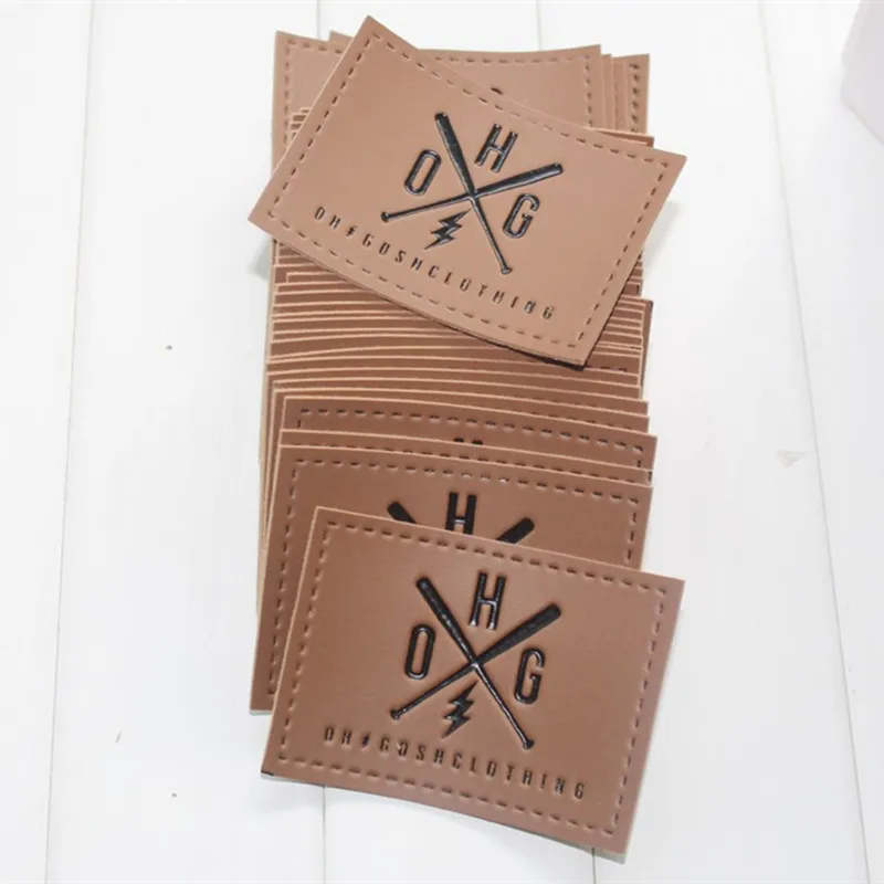 

Custom printed and debossed PU leather patch sew on small PU tag for bags 1000pcs lot