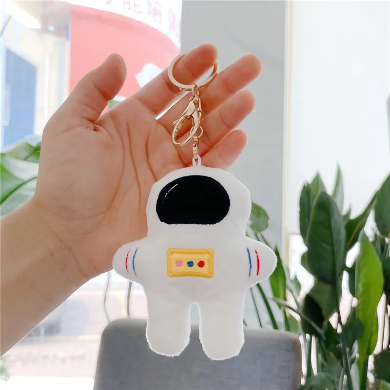 LLavero de muñeco de peluche de astronauta de dibujos animados, juguete colgante de mochila, regalo de cumpleaños para niños y niñas, 12CM, 1 unidad