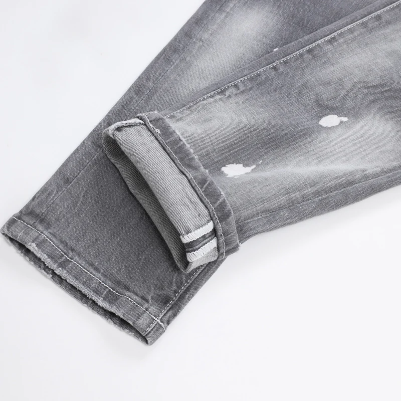 الشارع مصمم أزياء الرجال الجينز الرجعية رمادي تمتد سليم صالح رسمت ممزق الجينز الرجال Y2K العلامة التجارية خمر الدنيم السراويل Hombre